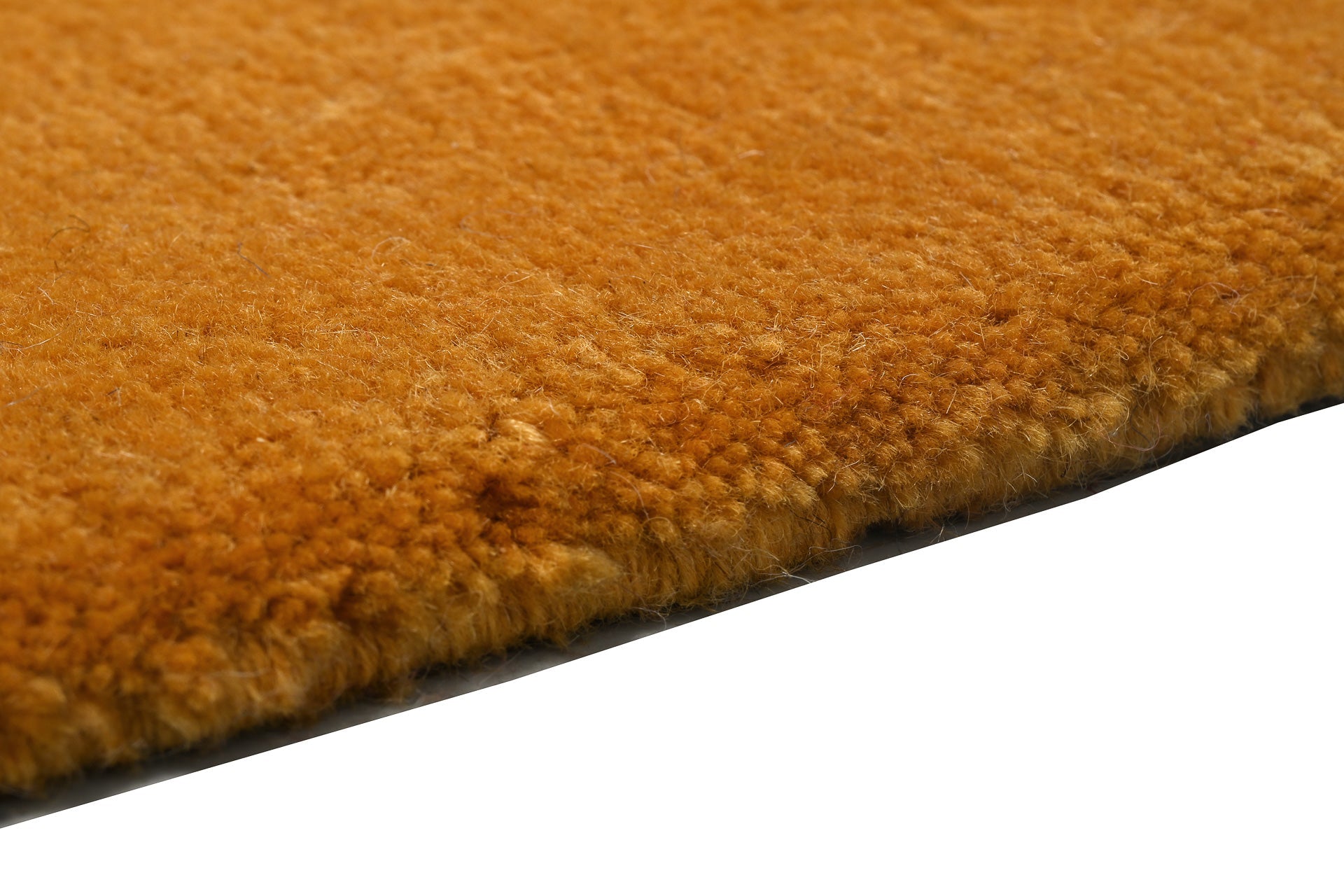 Handgeknüpfter tibeter Teppich in gold gelb mit Retro Bordüre – Neuwertig