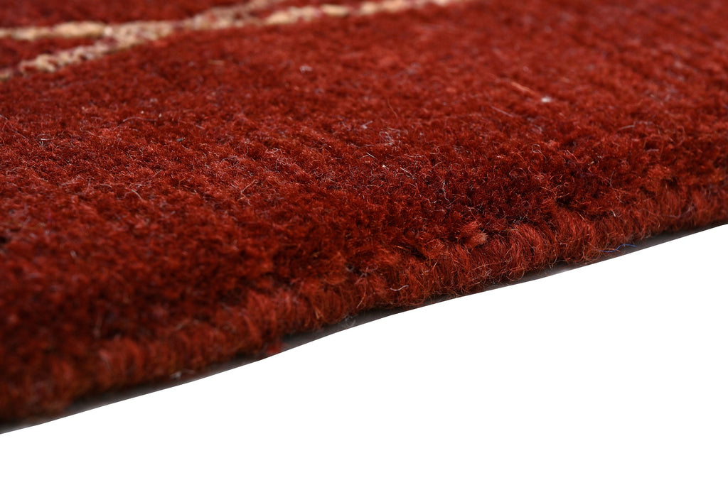 Handgeknüpfter tibetischer Teppich rot mit Retro Bordüre – Neuwertig