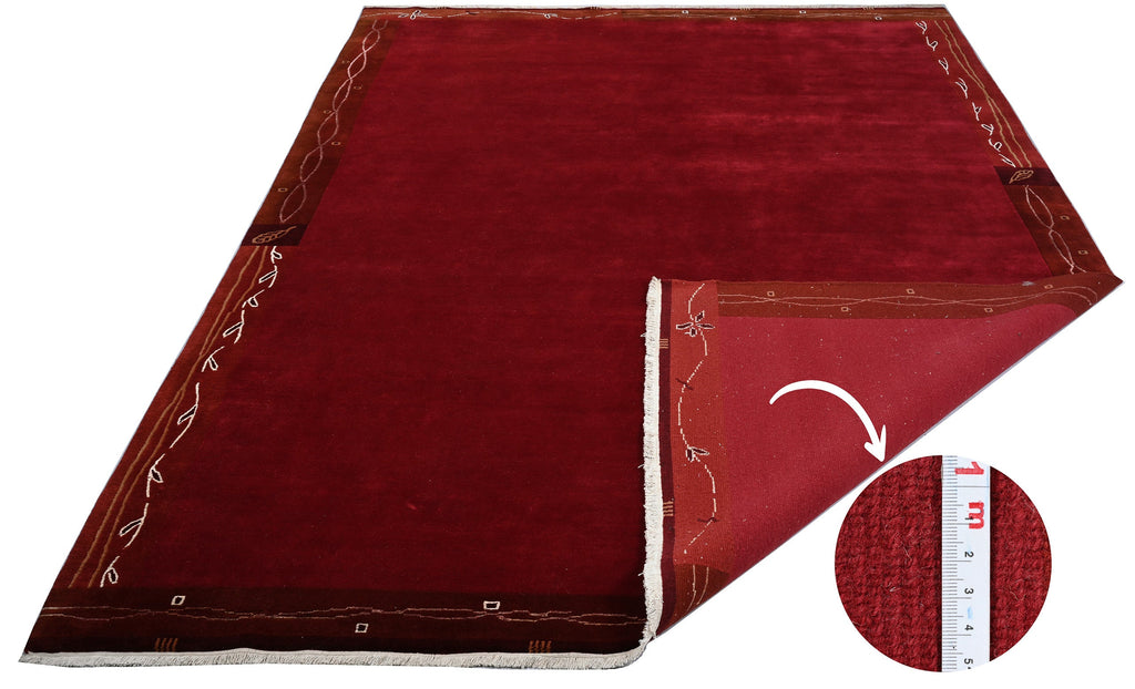 Handgeknüpfter tibetischer Teppich rot mit Retro Bordüre – Neuwertig