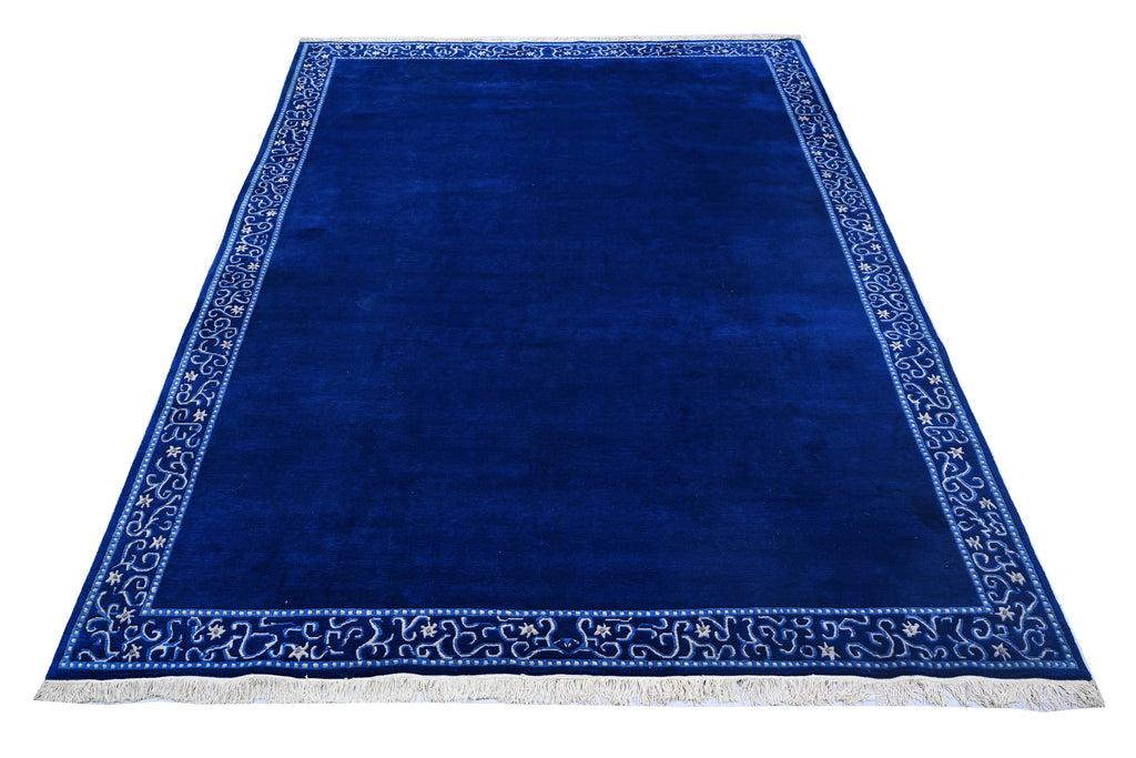 Handgeknüpfter tibetischer Teppich in blau mit Retro-Bordüre – Neuwertig