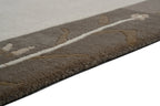 Handgeknüpfter Tibet Teppich in beige mit Retro Bordüre – Neuwertig
