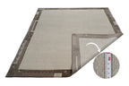 Handgeknüpfter Tibet Teppich in beige mit Retro Bordüre – Neuwertig