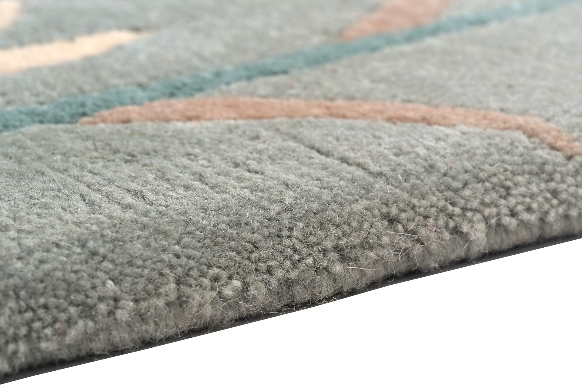 Handgeknüpfter Tibeter Teppich in grün mit Retro Bordüre – Neuwertig