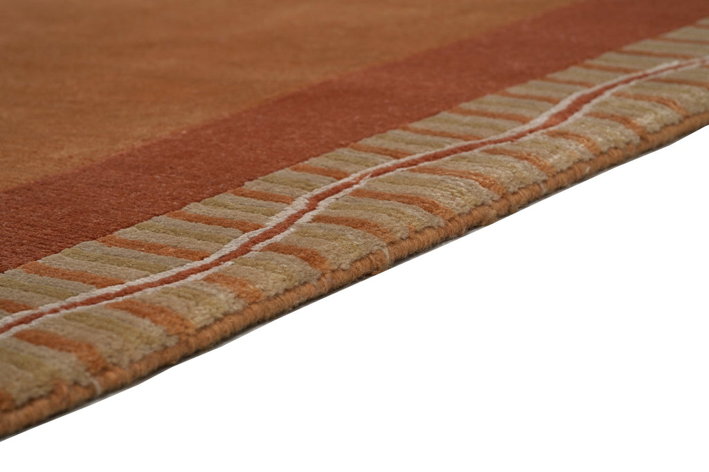 Handgeknüpfter tibetischer Teppich in rot braun mit Retro Bordüre – Neuwertig
