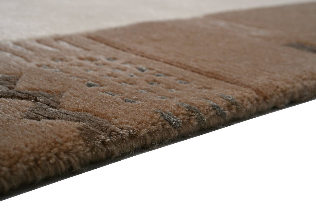 Handgeknüpfter Tibeter Teppich in beige mit Retro Bordüre – Neuwertig