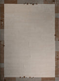 Handgeknüpfter Tibeter Teppich in beige mit Retro Bordüre – Neuwertig