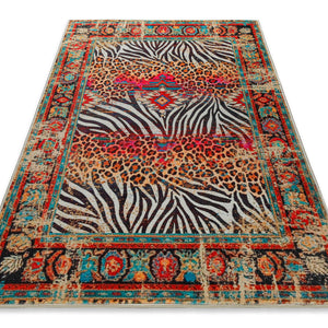 {"class" => "product-thumbnails__image", "alt" => "Badteppich Boho Safari in perspektivischer Ansicht mit farbenfrohem Zebra- und Leopardenmuster."}