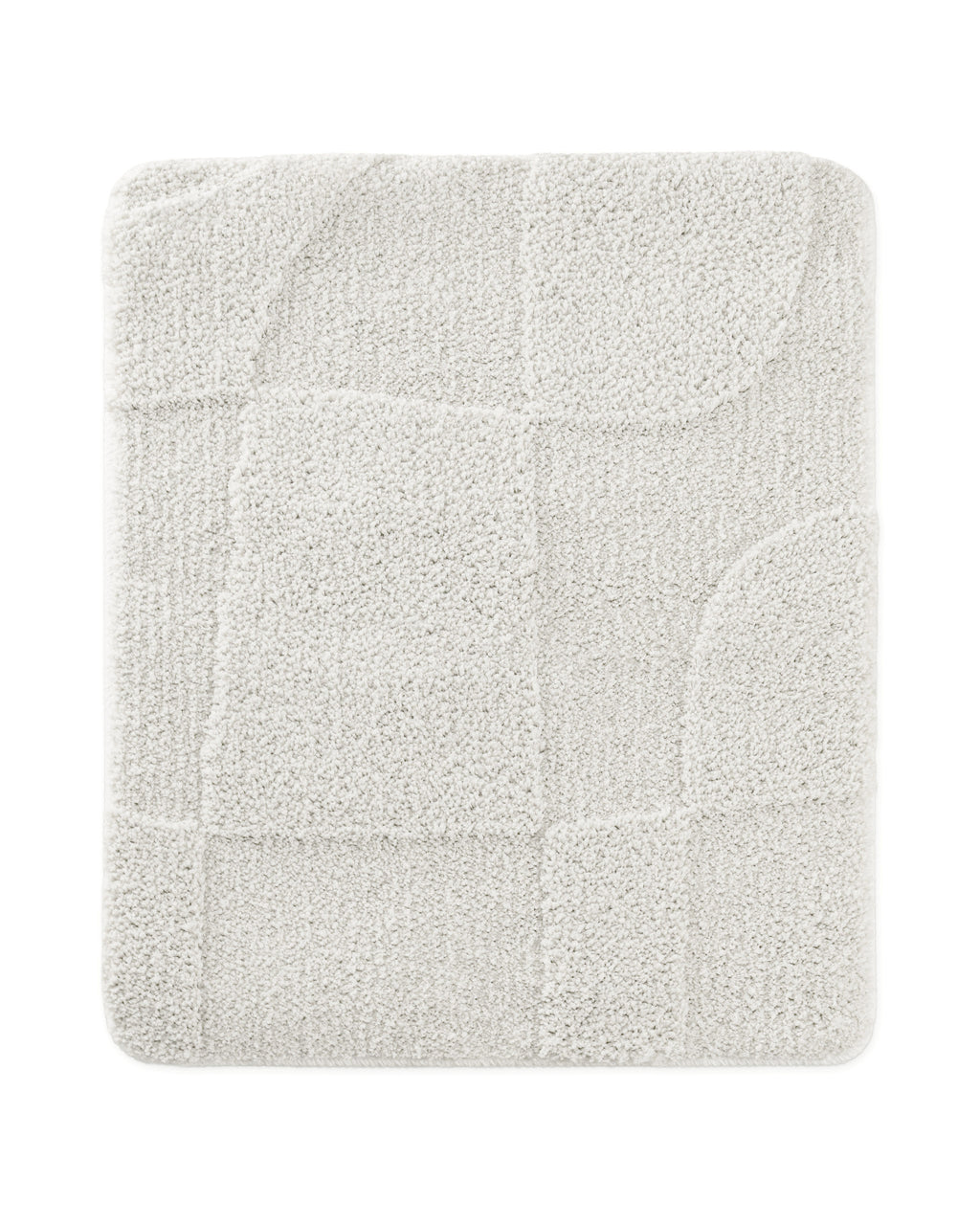 Badteppich von BathKing by WECONhome Davie Weiß rechteckig 55x65 cm, Draufsicht auf Matte mit eingeprägtem Linienmuster auf hellem Hintergrund