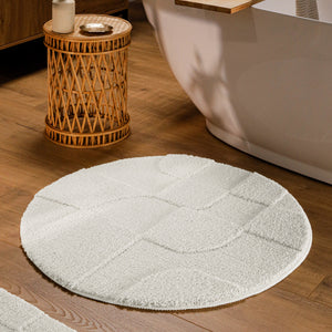 {"class" => "product-thumbnails__image", "alt" => "Runder Badteppich von BathKing by WECONhome Davie Weiß im Badezimmer vor Badewanne auf Holzboden, strukturiertes Linienrelief im Flor sichtbar"}