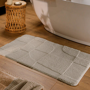 {"class" => "product-thumbnails__image", "alt" => "Badteppich von BathKing by WECONhome Davie Grau rechteckig im Badezimmer vor Badewanne auf Holzboden liegend, Strukturmuster im Flor sichtbar"}