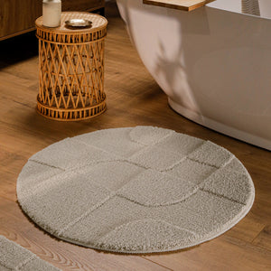 {"class" => "product-thumbnails__image", "alt" => "Runder Badteppich von BathKing by WECONhome Davie Grau im Badezimmer vor Badewanne auf Holzboden, strukturiertes Linienrelief im Flor sichtbar"}