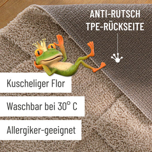 {"class" => "product-thumbnails__image", "alt" => "Badteppich von BathKing by WECONhome Davie Sand Beige Detailaufnahme Flor auf Holzfußboden, eingeblendete Hinweise zu rutschhemmender Rückseite und Waschbarkeit"}