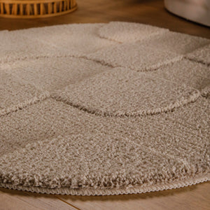 {"class" => "product-thumbnails__image", "alt" => "Badteppich von BathKing by WECONhome Davie Sand Beige rund im Badezimmer auf Holzboden neben Badewanne, Florstruktur und Linienrelief erkennbar"}