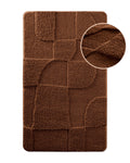 Badteppich von BathKing by WECONhome Davie Cognac Braun, Draufsicht mit Detailkreis der Florstruktur und eingeprägtem Muster auf weißem Hintergrund