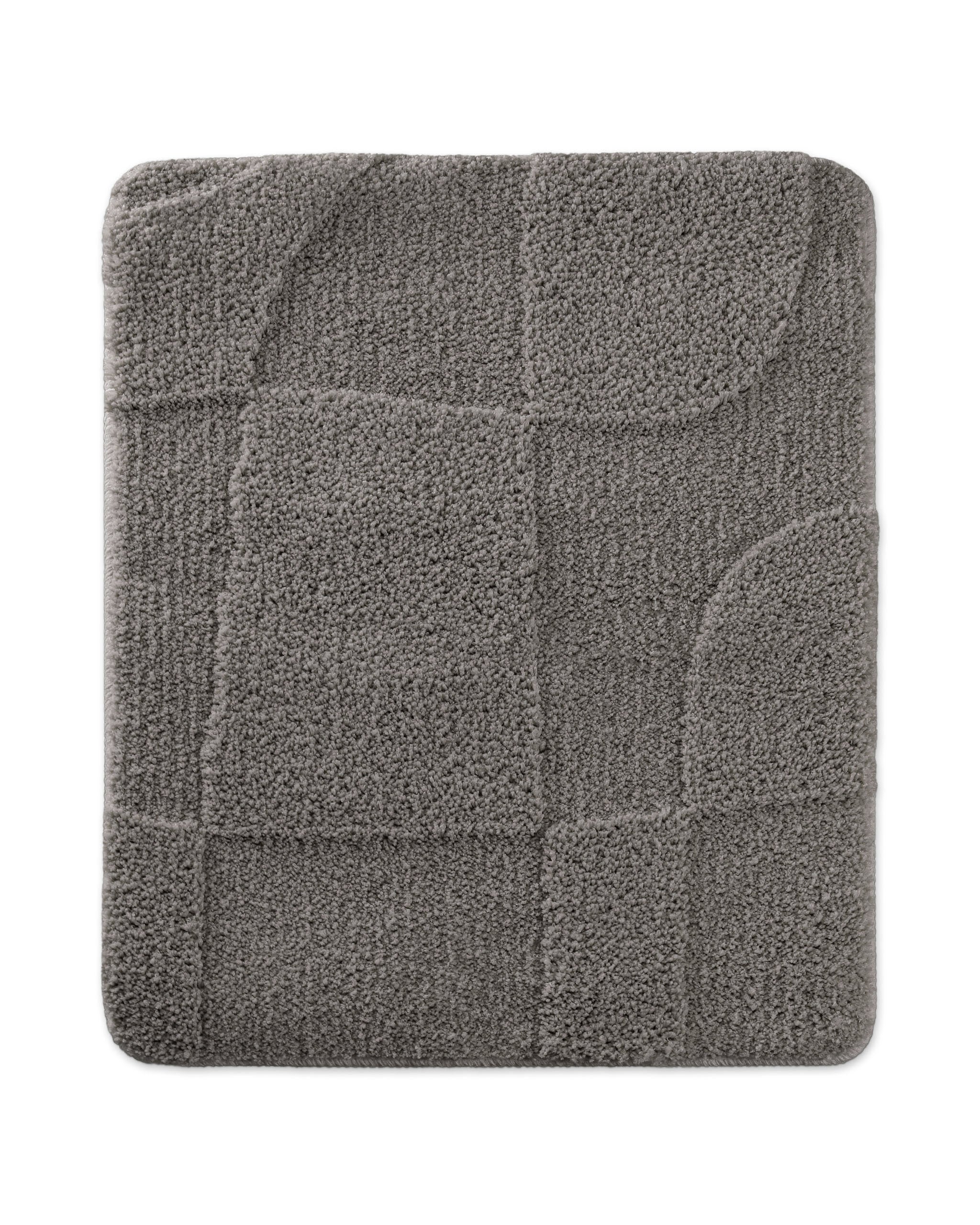Badteppich von BathKing by WECONhome Davie Basalt Grau rechteckig 55x65 cm, Draufsicht auf Matte mit eingeprägtem Linienmuster auf hellem Hintergrund