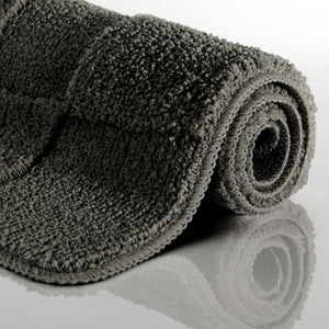 {"class" => "product-thumbnails__image", "alt" => "Badteppich von BathKing by WECONhome Davie Anthrazit Grau aufgerollt auf hellem Hintergrund, Seitenansicht zeigt Florhöhe und Teppichkante"}