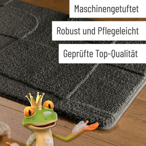 {"class" => "product-thumbnails__image", "alt" => "Badteppich von BathKing by WECONhome Davie Anthrazit Grau Detail der Teppichkante auf Holzfußboden, eingeblendete Hinweise zu Verarbeitung und Pflege"}
