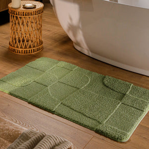 {"class" => "product-thumbnails__image", "alt" => "Badteppich von BathKing by WECONhome Davie Reseda Grün rechteckig im Badezimmer vor Badewanne auf Holzboden liegend, Strukturmuster im Flor sichtbar"}