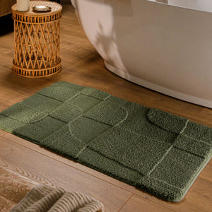 {"class" => "product-thumbnails__image", "alt" => "Badteppich von BathKing by WECONhome Davie Kiefer Grün rechteckig im Badezimmer vor Badewanne auf Holzboden liegend, Strukturmuster im Flor sichtbar"}