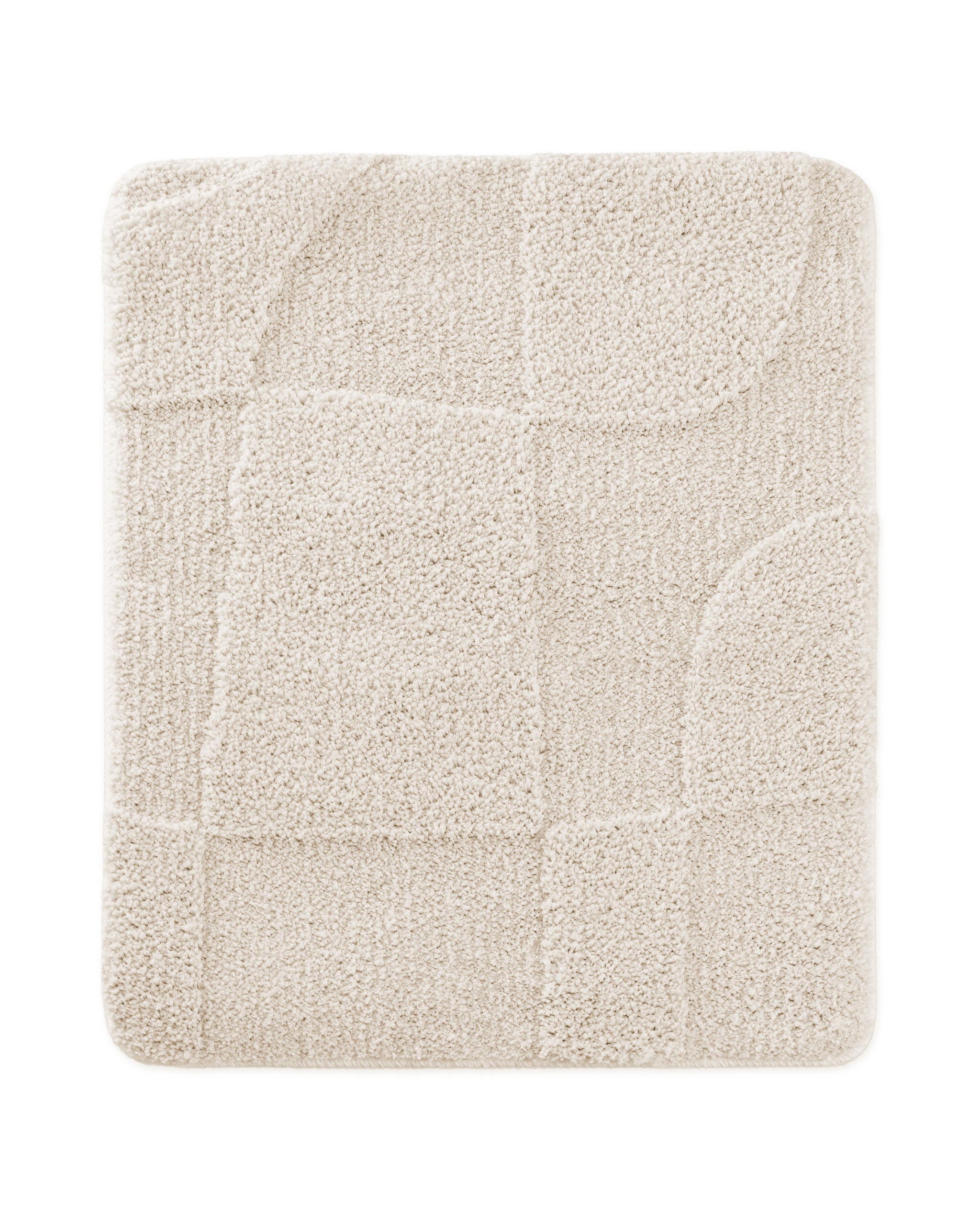 Badteppich von BathKing by WECONhome Davie Creme Weiß rechteckig 55x65 cm, Draufsicht auf Matte mit eingeprägtem Linienmuster auf hellem Hintergrund