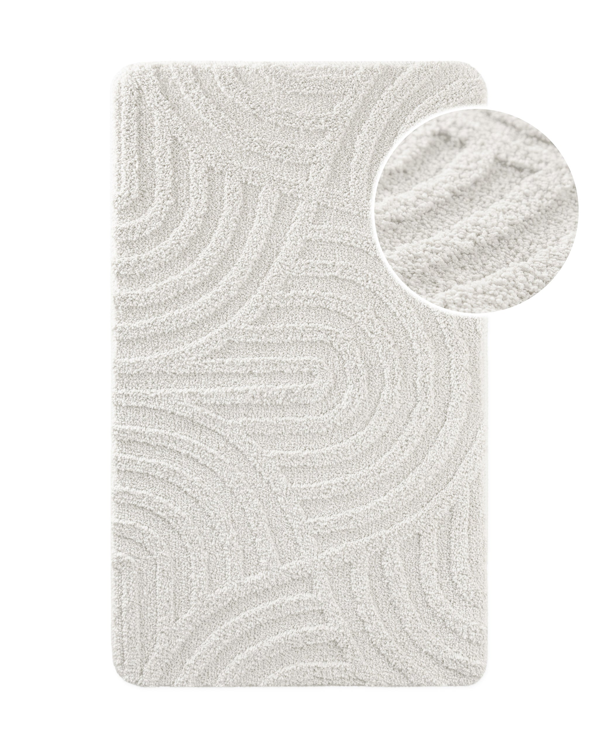 Badteppich von BathKing by WECONhome Fiete Weiß, Draufsicht mit Detailkreis der Florstruktur und eingeprägtem Linienmuster auf weißem Hintergrund
