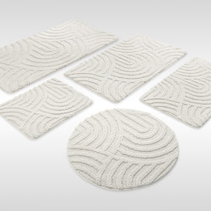 {"class" => "product-thumbnails__image", "alt" => "Badteppich von BathKing by WECONhome Fiete Weiß Set aus rechteckigen und runden Badmatten, mehrere Größen auf hellem Hintergrund angeordnet"}