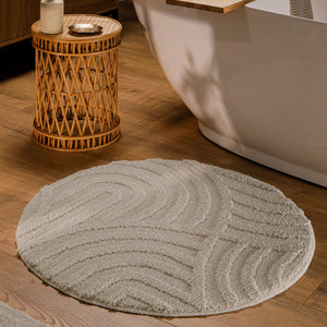 {"class" => "product-thumbnails__image", "alt" => "Runder Badteppich von BathKing by WECONhome Fiete Grau im Badezimmer vor Badewanne auf Holzboden, strukturiertes Linienrelief im Flor sichtbar"}