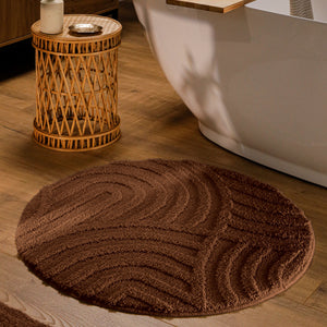 {"class" => "product-thumbnails__image", "alt" => "Runder Badteppich von BathKing by WECONhome Fiete Braun im Badezimmer vor Badewanne auf Holzboden, strukturiertes Linienrelief im Flor sichtbar"}