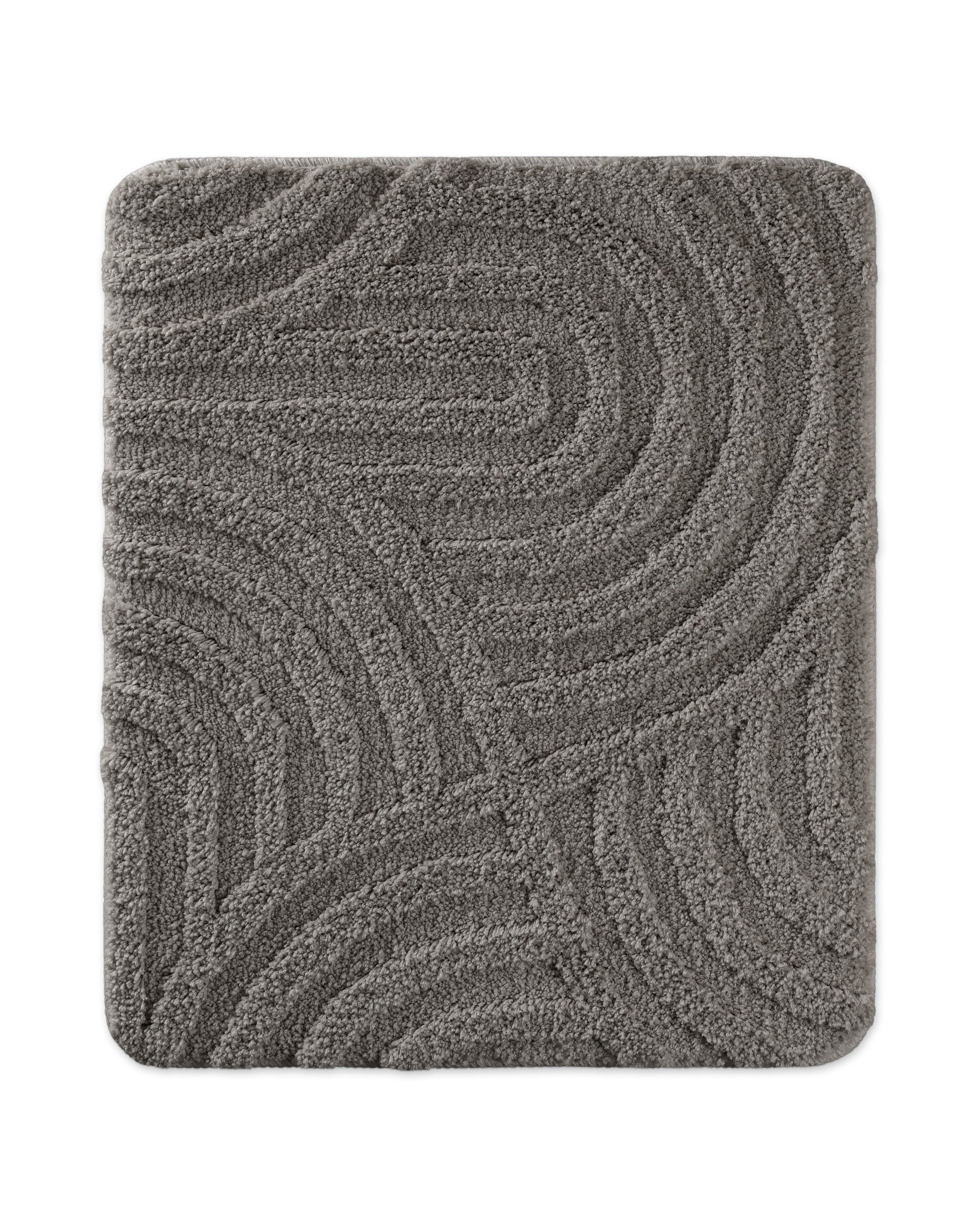 Badteppich von BathKing by WECONhome Fiete Basalt Grau rechteckig 55x65 cm, Draufsicht auf Matte mit eingeprägtem Linienmuster auf hellem Hintergrund