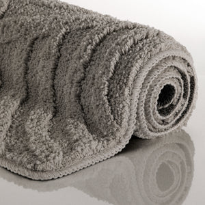 {"class" => "product-thumbnails__image", "alt" => "Badteppich von BathKing by WECONhome Fiete Basalt Grau aufgerollt auf hellem Hintergrund, Seitenansicht zeigt Florhöhe und Teppichkante"}