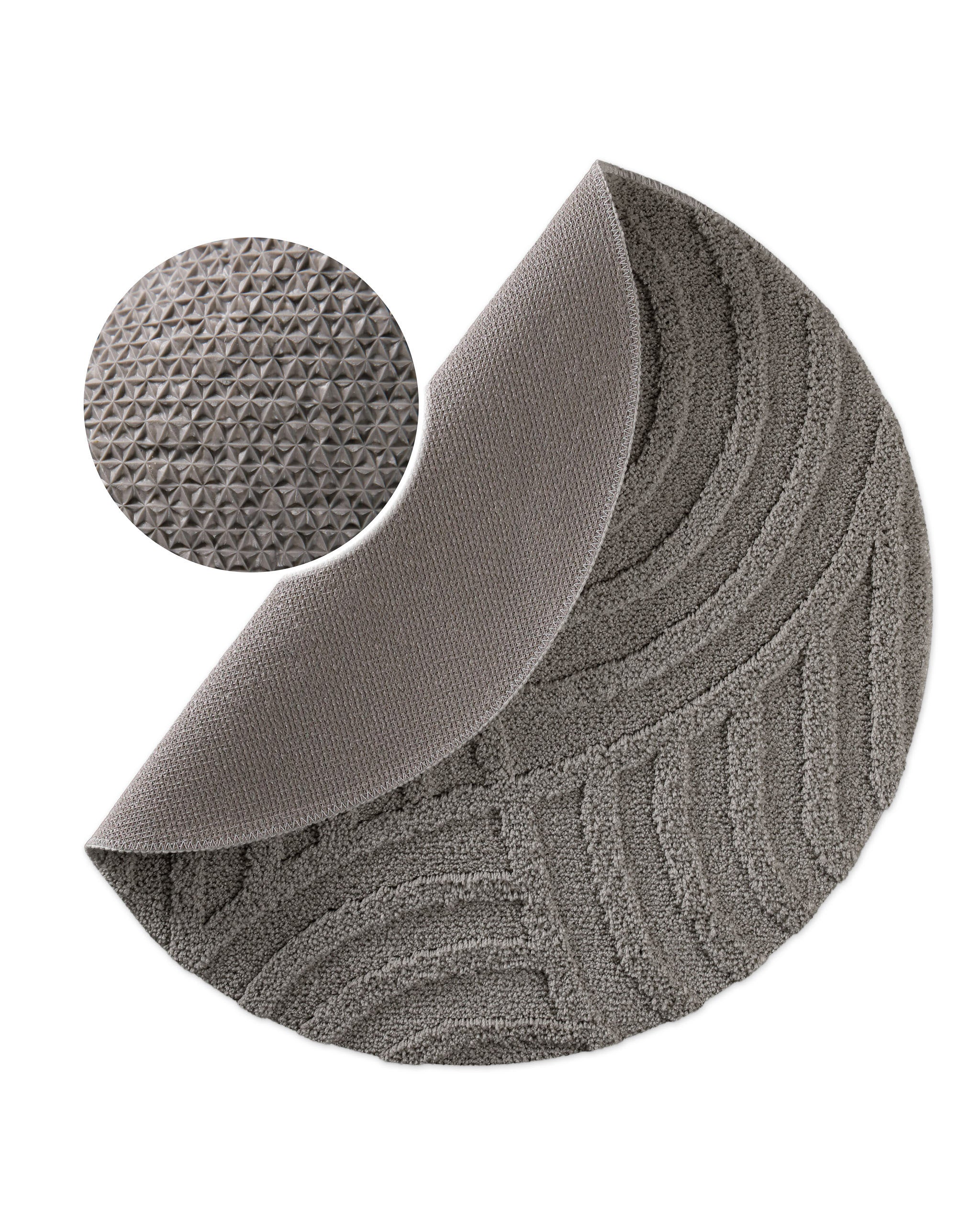 Badteppich von BathKing by WECONhome Fiete Basalt Grau rund, angehobene Ecke zeigt Basalt Graue Rückseite mit rutschhemmender Beschichtung