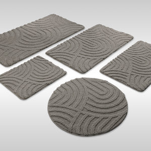 {"class" => "product-thumbnails__image", "alt" => "Badteppich von BathKing by WECONhome Fiete Basalt Grau Set aus rechteckigen und runden Badmatten, mehrere Größen auf hellem Hintergrund angeordnet"}