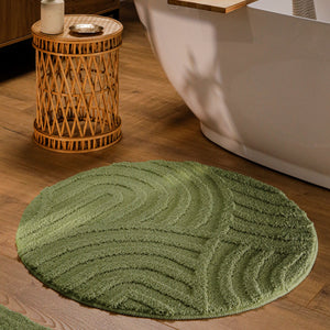 {"class" => "product-thumbnails__image", "alt" => "Runder Badteppich von BathKing by WECONhome Fiete Reseda Grün im Badezimmer vor Badewanne auf Holzboden, strukturiertes Linienrelief im Flor sichtbar"}