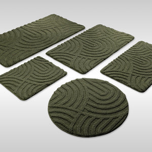 {"class" => "product-thumbnails__image", "alt" => "Badteppich von BathKing by WECONhome Fiete Kiefer Grün Set aus rechteckigen und runden Badmatten, mehrere Größen auf hellem Hintergrund angeordnet"}
