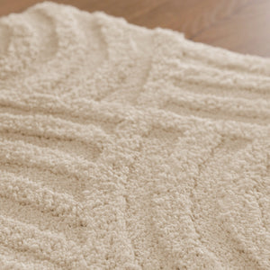 {"class" => "product-thumbnails__image", "alt" => "Badteppich von BathKing by WECONhome Fiete Creme Weiß Nahaufnahme der Florstruktur, Linienrelief im dichten Teppichflor sichtbar"}