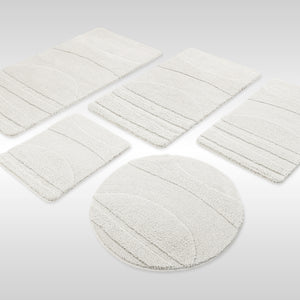 {"class" => "product-thumbnails__image", "alt" => "Badteppich von BathKing by WECONhome Marc Weiß Set aus rechteckigen und runden Badmatten, mehrere Größen auf hellem Hintergrund angeordnet"}