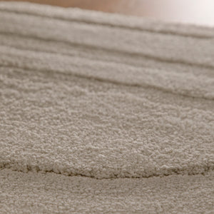 {"class" => "product-thumbnails__image", "alt" => "Badteppich von BathKing by WECONhome Marc Grau Nahaufnahme der Florstruktur, Linienrelief im dichten Teppichflor sichtbar"}