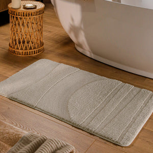 {"class" => "product-thumbnails__image", "alt" => "Badteppich von BathKing by WECONhome Marc Grau rechteckig im Badezimmer vor Badewanne auf Holzboden liegend, Strukturmuster im Flor sichtbar"}