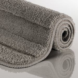 {"class" => "product-thumbnails__image", "alt" => "Badteppich von BathKing by WECONhome Marc Basalt Grau aufgerollt auf hellem Hintergrund, Seitenansicht zeigt Florhöhe und Teppichkante"}
