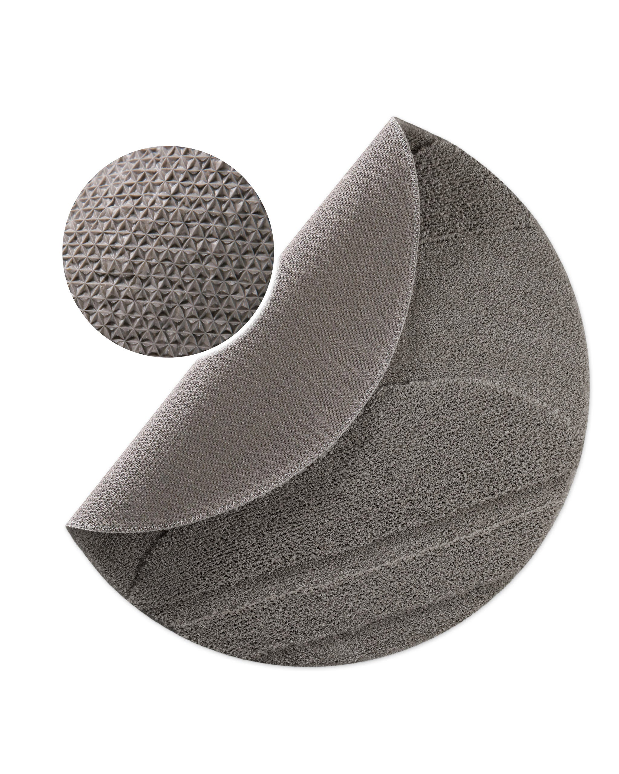 Badteppich von BathKing by WECONhome Marc Basalt Grau rund, angehobene Ecke zeigt Basalt Graue Rückseite mit rutschhemmender Beschichtung
