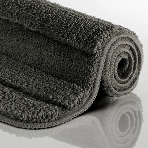 {"class" => "product-thumbnails__image", "alt" => "Badteppich von BathKing by WECONhome Marc Anthrazit Grau aufgerollt auf hellem Hintergrund, Seitenansicht zeigt Florhöhe und Teppichkante"}