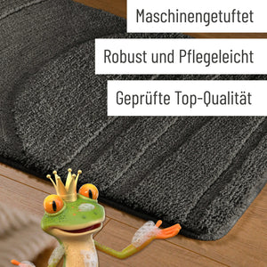 {"class" => "product-thumbnails__image", "alt" => "Badteppich von BathKing by WECONhome Marc Anthrazit Grau Detail der Teppichkante auf Holzfußboden, eingeblendete Hinweise zu Verarbeitung und Pflege"}