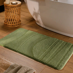{"class" => "product-thumbnails__image", "alt" => "Badteppich von BathKing by WECONhome Marc Reseda Grün rechteckig im Badezimmer vor Badewanne auf Holzboden liegend, Strukturmuster im Flor sichtbar"}