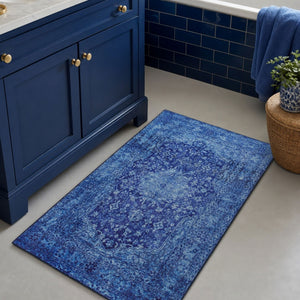 {"class" => "product-thumbnails__image", "alt" => "Blauer Vintage-Badteppich Ralph im Badezimmer vor einem Waschtisch dekorativ ausgelegt."}