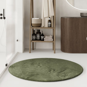 {"class" => "product-thumbnails__image", "alt" => "Emil Badteppich oliv grün Hochflor rund im Badezimmer"}