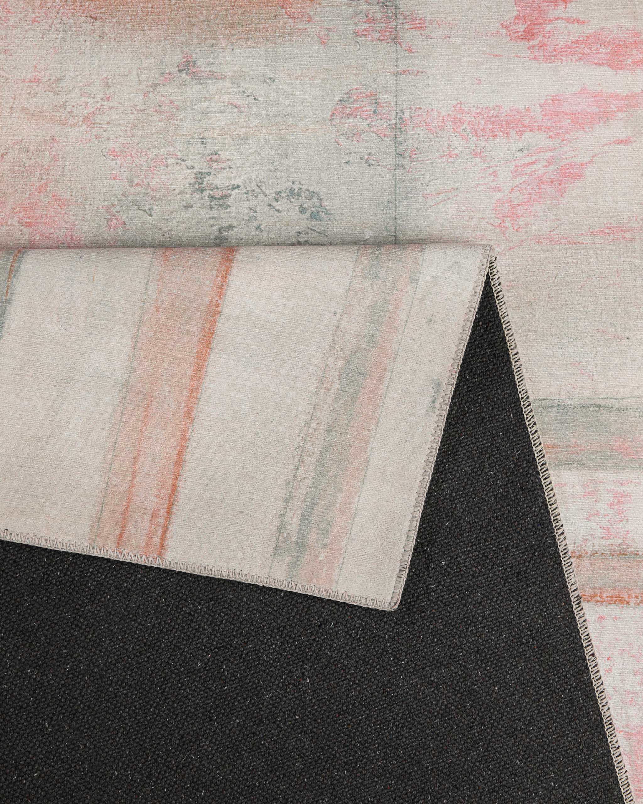 Esprit Flachwebteppich "Maui" Alt Rosa, Detailaufnahme der gekettelten Kante vor dunklem Hintergrund