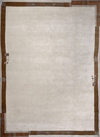 Handgeknüpfter Tibet Teppich in beige mit schmaler Retro Bordüre – Neuwertig