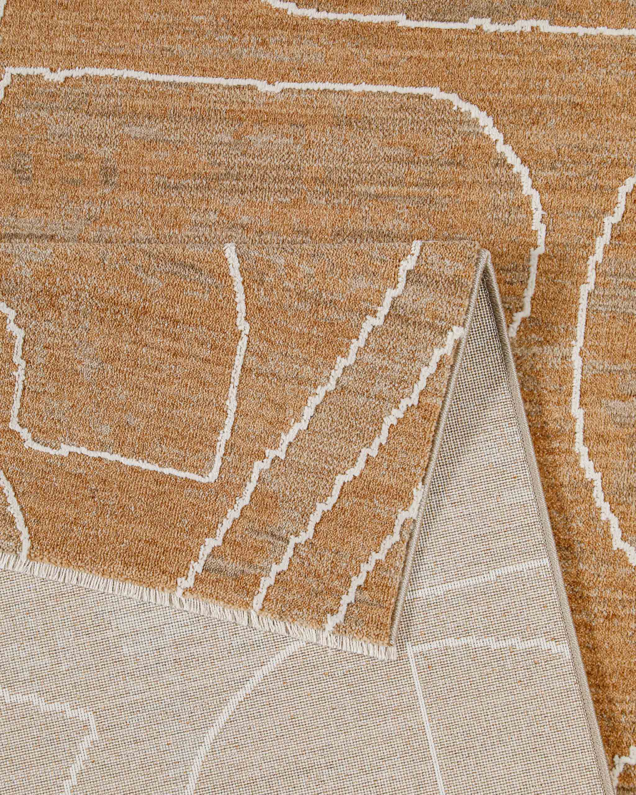 Esprit Kurzflor Teppich Beatle-B in Braun Bunt Detailaufnahme der Teppichkante und hochwertigen Verarbeitung