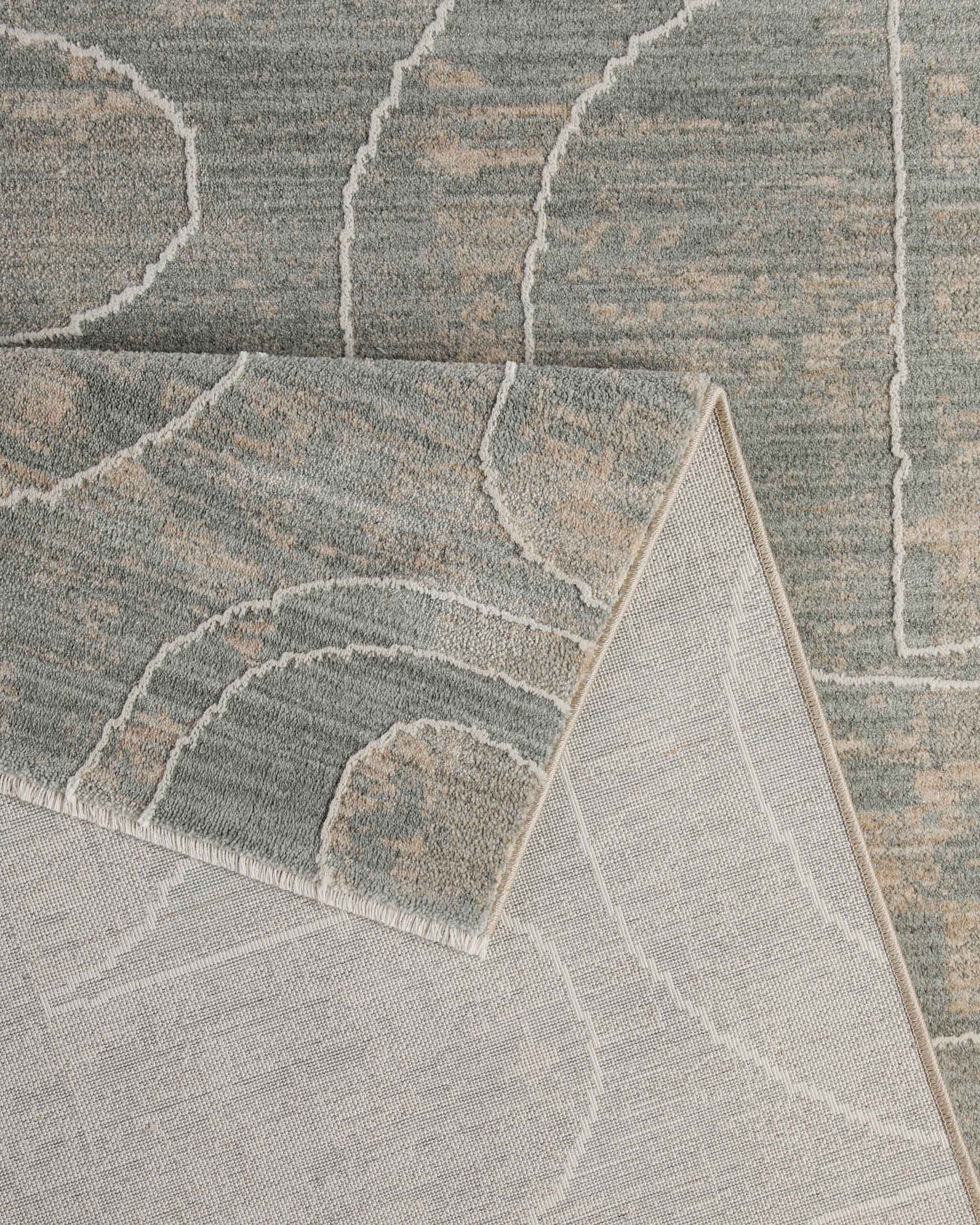 Esprit Kurzflor Teppich Beatle-B in Türkis Grau Detailaufnahme der Teppichkante und hochwertigen Verarbeitung