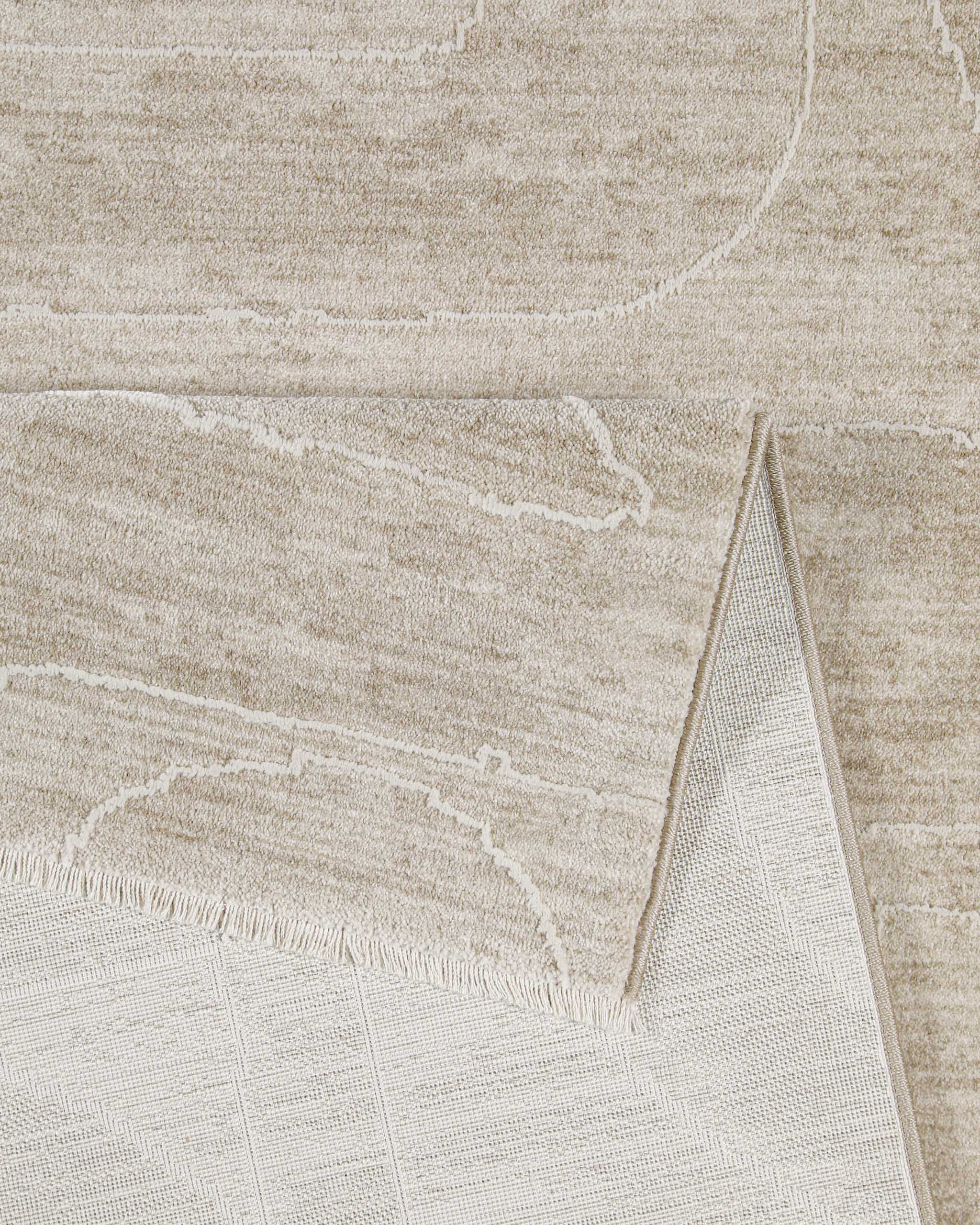 Esprit Kurzflor Teppich Beatle-B in Beige Bunt Detailaufnahme der Teppichkante und hochwertigen Verarbeitung